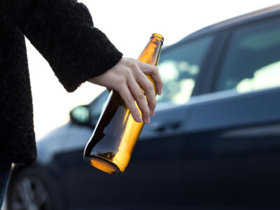 in charge of a vehicle while above the legal limit mean